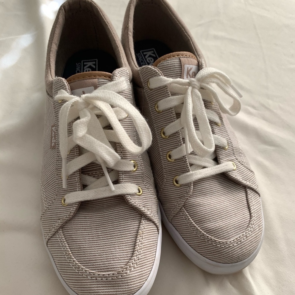 Tan and white Keds
